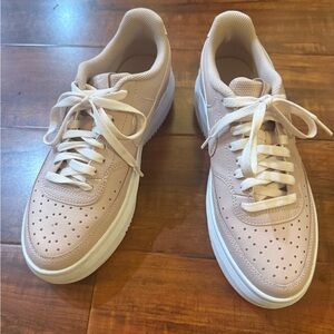 Cute Pink and White Women’s Athletic Shoes, Nike.